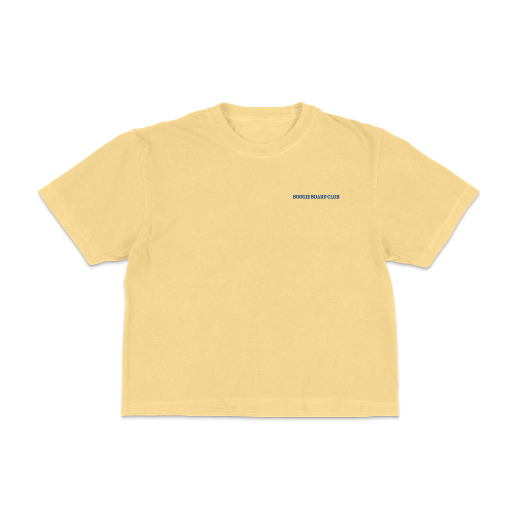 Front view of Coastal Operations Women’s Heavyweight Boxy Tee in Butter with minimal Coastal Operations front mark