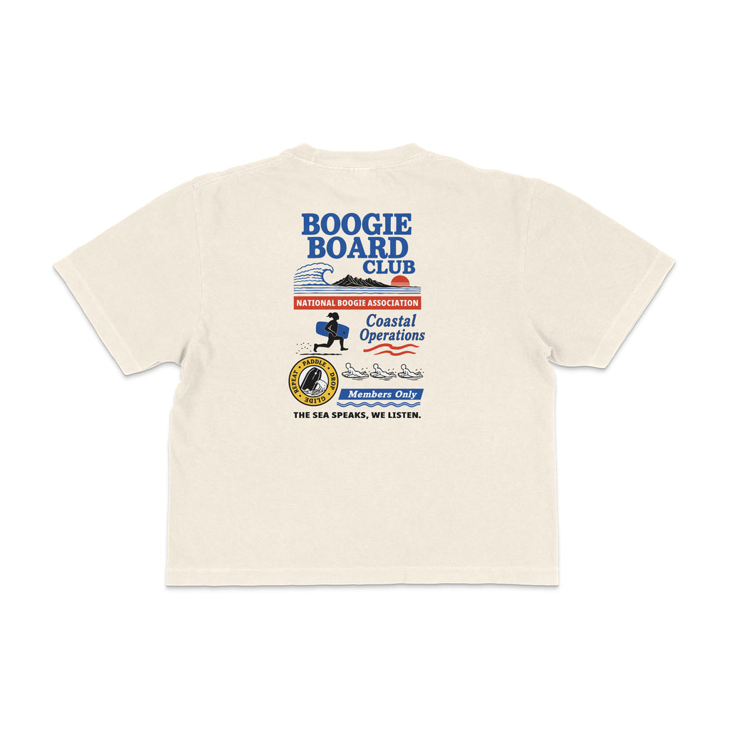 Back view of Coastal Operations Women’s Heavyweight Boxy Tee in Ivory with large multi-badge Coastal Operations graphic
